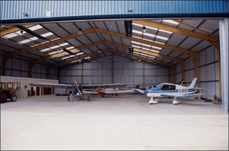 China Easy Expansion Aircraft Hangar Buildings With Minimal Material Loss supplier