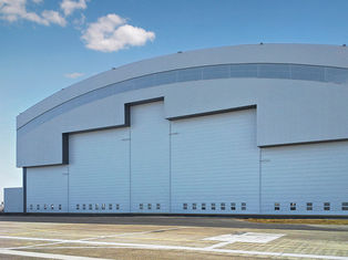 China Prefab Curve Roofing System Steel Aircraft Hangars With Electrical Slide Doors supplier